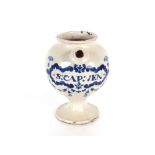 A 17th Century London Delft wet drug jar of generous baluster proportions, painted in blue with a