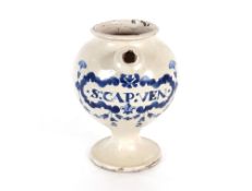 A 17th Century London Delft wet drug jar of generous baluster proportions, painted in blue with a