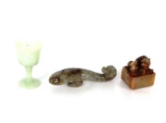 A Chinese jade belt hook; a square scholars seal; and a small jade pedestal wine cup