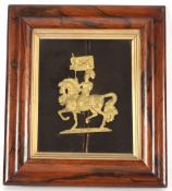 A 19th Century gilded figure of a knight on horseback, contained in a glazed rosewood frame