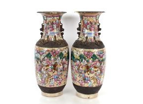 A pair of 19th Century Chinese Canton baluster floor vases, having famille rose and figure