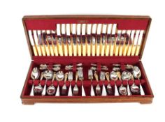 An oak cased canteen of Empire cutlery for twelve persons