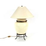 A large crackled glaze cream pottery baluster table lamp, on bronzed ring base complete with