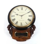 A 19th Century rosewood cased wall clock, having carved foliate decoration, circular white enamel