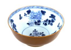 A Nanking Cargo mid-18th Century Batavia ware bowl, the exterior with café au lait glaze, the