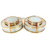 A pair of brass and opaque glass Art Deco design circular ceiling lights, 46cm dia.