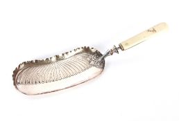 A late Victorian silver crumb scoop, with bone handle, Sheffield 1897, 32cm long