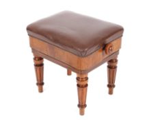 A Victorian mahogany adjustable piano stool by Henry Brooks Of London, raised on turned fluted