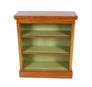 A pair of good quality burr oak and cross banded open fronted bookcases, fitted adjustable shelves