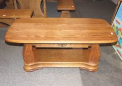 A modern design golden oak two tier coffee table, 121cm wide x 60cm deep x 45cm high