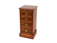 A pair of good quality walnut and cross banded bedside chests fitted brushing slides and four