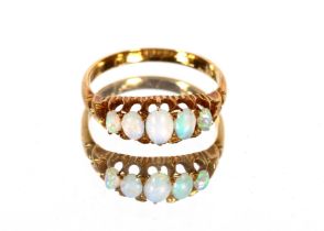 An antique five stone opal ring, the graduated ov