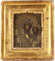 An Icon with gilded Oklad, contained in gilt wood outer frame, 28cm x 25cm overall