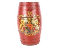 A red painted coopered spirit barrel stick stand, decorated Royal cipher, 54cm high
