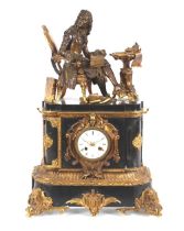 A 19th Century French black marble and Ormolu mounted mantel clock, surmounted by a seated bronze