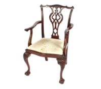 A set of six mahogany Chippendale design dining chairs, raised on carved cabriole supports