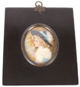 Two 19th Century hand painted miniatures of young ladies in typical papier mâché frames, the reverse