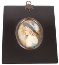 Two 19th Century hand painted miniatures of young ladies in typical papier mâché frames, the reverse