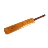An early 20th Century cricket bat, Warwickshire V Hampshire 1924, multiple signatures, the bat