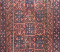An Afghan rug, having central linked field within multi geometric borders, flat weave ends, 160cm