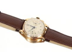 An 18ct chronograph Suisse gent's wrist watch on b