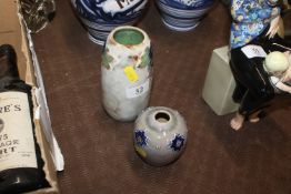 Two Royal Doulton stoneware vases, having raised f