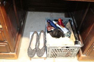 A box containing a sheepskin hat; vintage handbags