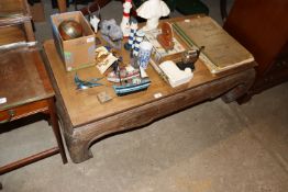 An Oriental hardwood coffee table