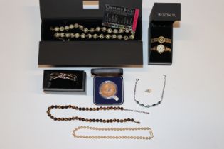 A box of assorted costume jewellery