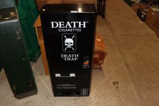 A "Death Trap" cigarette vending machine