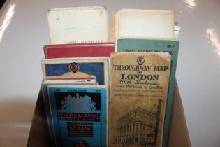 A box of assorted vintage maps