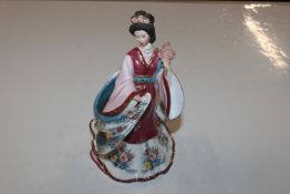A Danbury Mint figurine "The Plum Blossom Princess