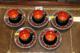 A Soho pottery coffee cans and saucers