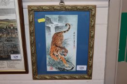 An Oriental coloured print of a tiger