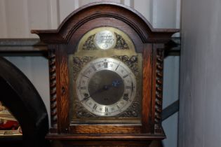 An oak cased Tempus Fugit grandmother clock