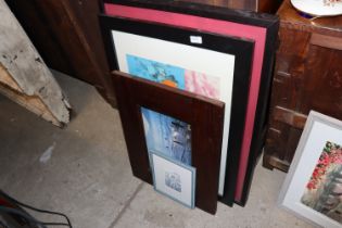 A quantity of various picture frames and prints