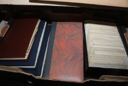 A box containing photograph album, five post-card