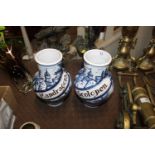 Two large blue and white Majolica style jars inscr