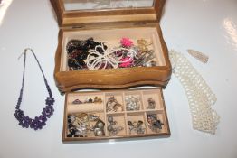 A wooden jewellery box and contents of various cos