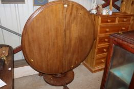 A Victorian mahogany circular snap top supper tabl