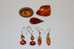 A pair of 925 silver and amber ear-rings; an ambe