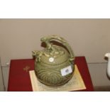 A Chinese celadon glazed Cagodan tea pot with impr