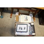 Two boxes containing various pictures and prints