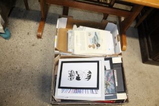 Two boxes containing various pictures and prints