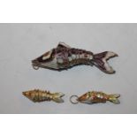 A large enamelled silver gilt articulated fish and