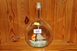A vintage ship in a bottle ornament