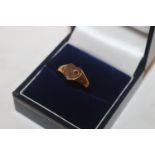 A 9ct gold ring of heart shape set with coloured stone, ring size N, approx. total weight 2.2gms