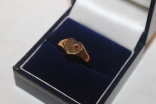 A 9ct gold ring of heart shape set with coloured stone, ring size N, approx. total weight 2.2gms