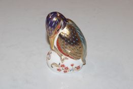 A Royal Crown Derby paperweight in the form of a k