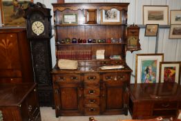 A good quality Ipswich oak dresser with shelved an